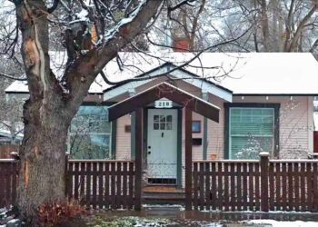 This classic 1925 pink cottage was restored for contemporary dwelling