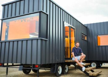 Man Creates Spacious Tiny Residence by Becoming a member of Two Trailers